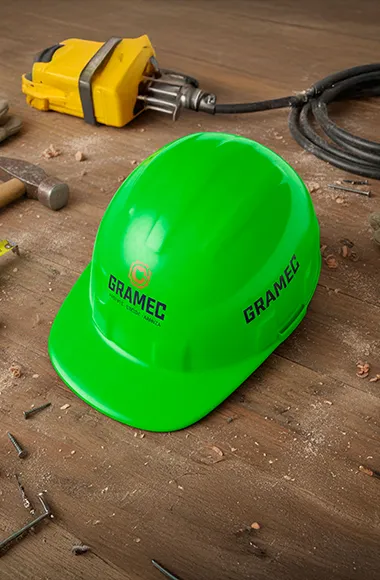 Mockup de marca GRAMEC aplicado a piezas industriales